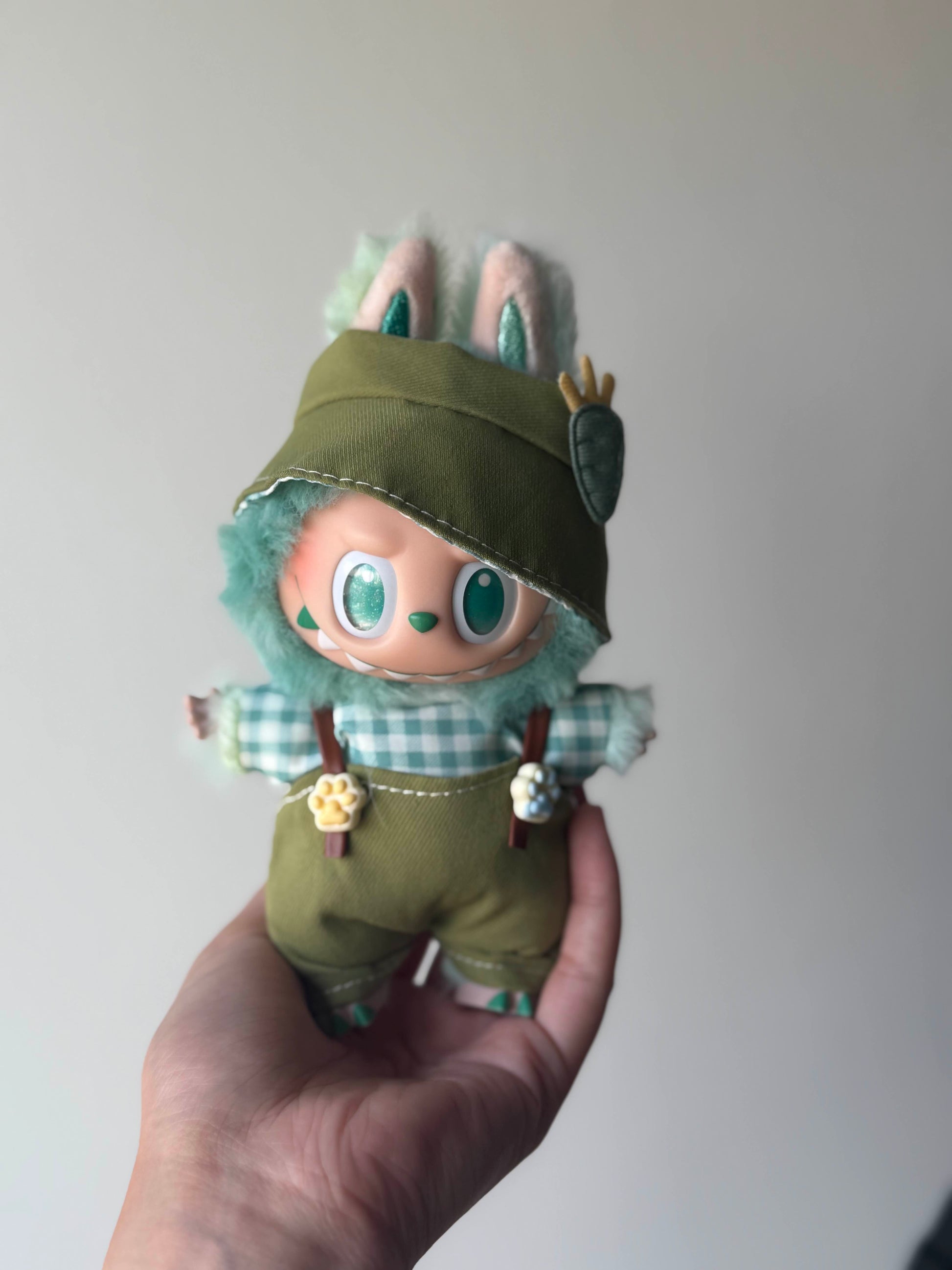 Green overalls withplaid shirts