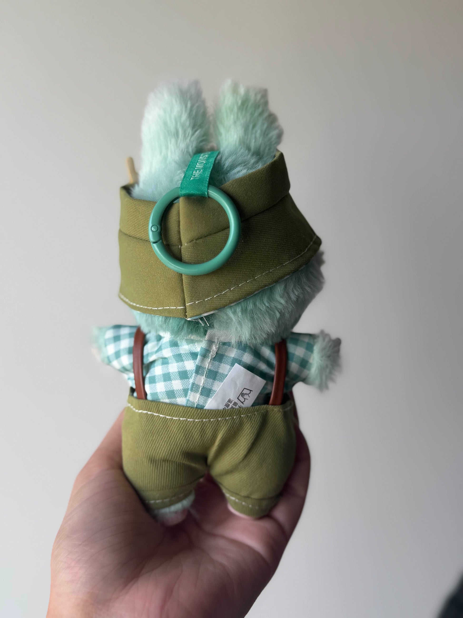 Green overalls withplaid shirts